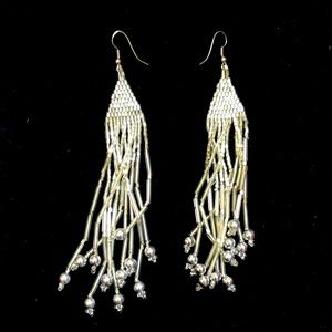 Silver beaded drop earrings.